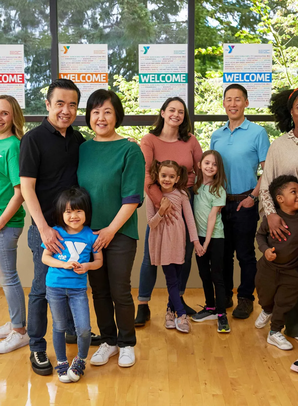 group of people standing in a ymca