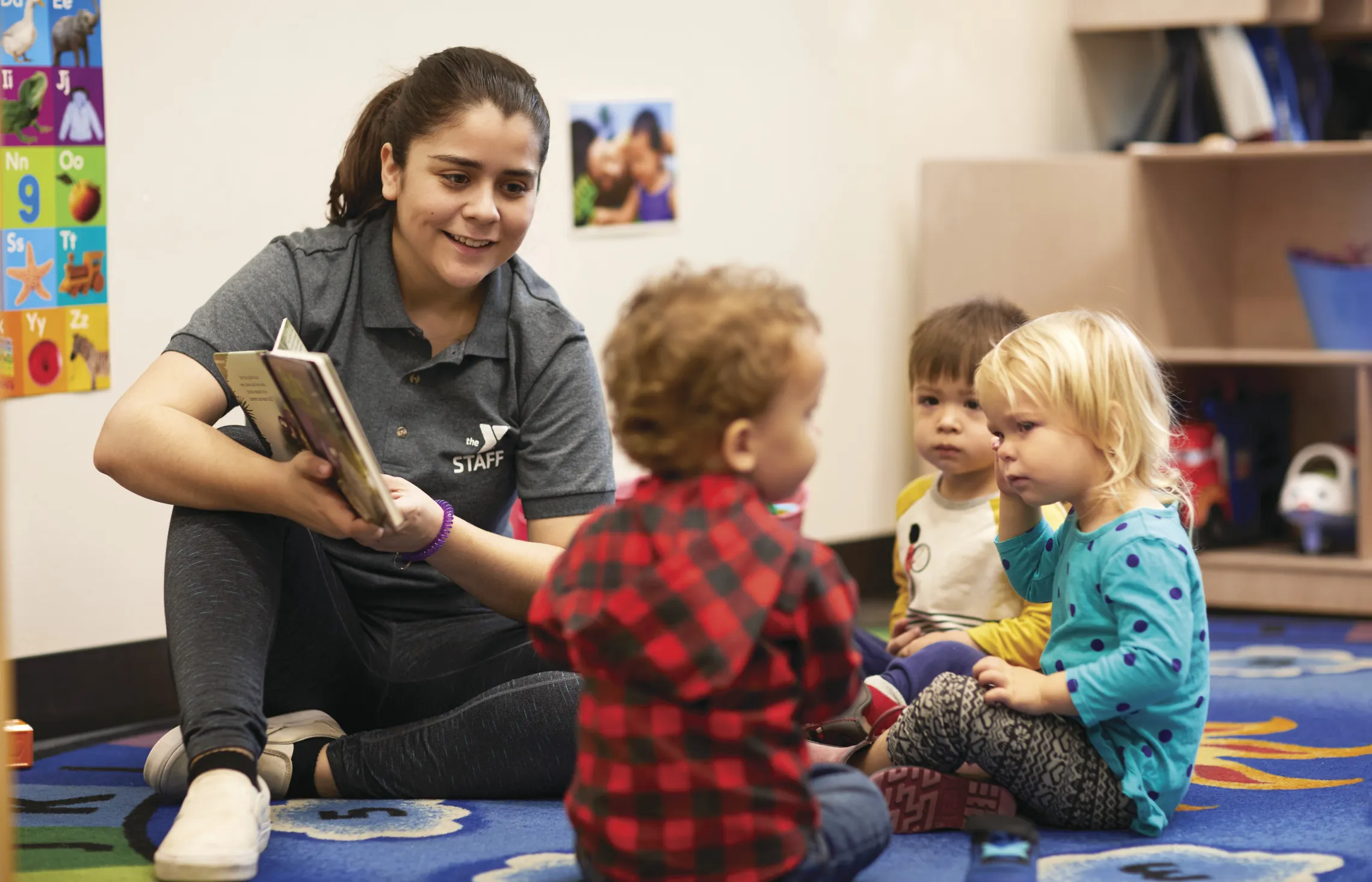 staff reading to kids