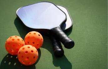 pickleball with orange balls